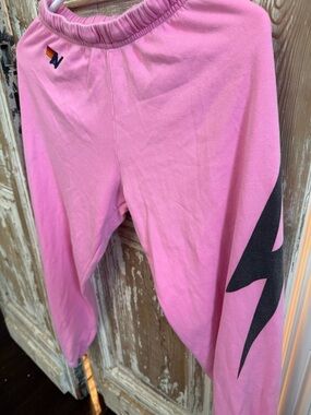 Women’s Aviator Nation Pink Sweatpants with Black Lightning Sleeve and Logo
